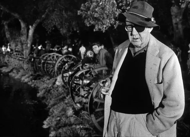 Director John Ford holding cigar and wearing the eye patch he needed late in life, on set of Civil War scene, the Battle of Shiloh, fr. his film "How the West Was Won."