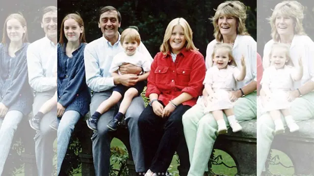 Archive family group photograph with children, shown in a faded-edge presentation.