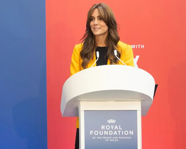 Archive photograph of Catherine speaking at a Royal Foundation podium.