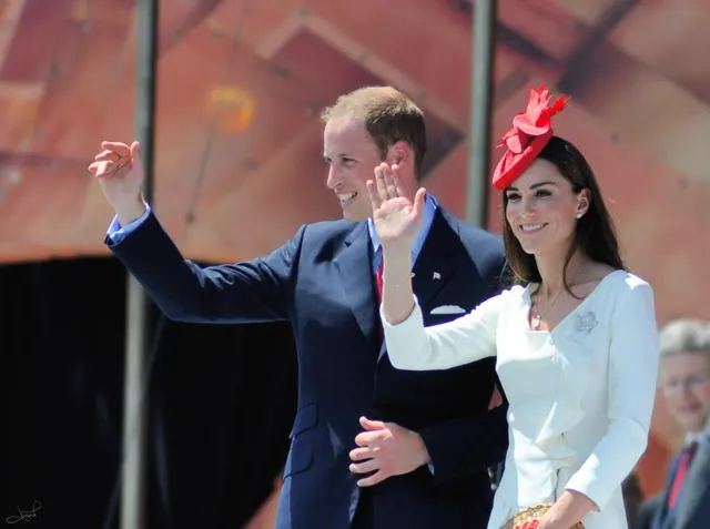 Archive photograph of William and Catherine waving at a public appearance.