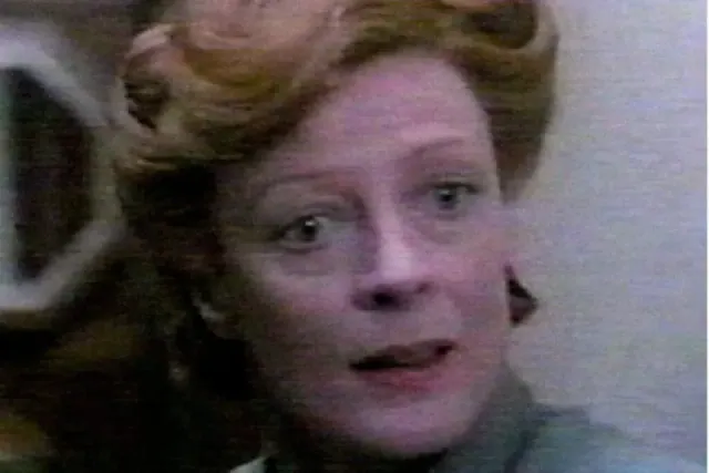 Color photo of Smith in a mid-career movie role
