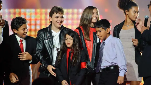Members of the Jackson family, including his children Paris, Prince Michael Jr and Blanket on stage at the 'Michael Forever' Michael Jackson tribute concert at the Millennium Stadium on October 08, 2011 in Cardiff, Wales.