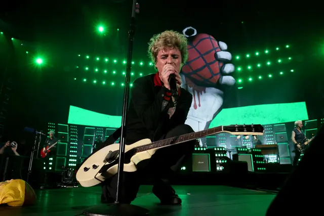 Green Day performing on stage