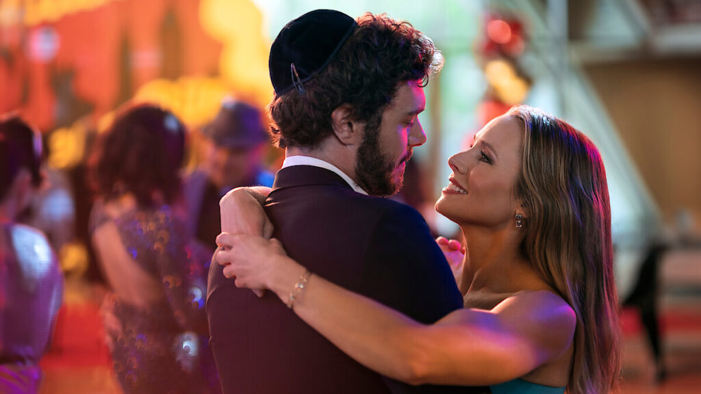 Adam Brody and Kristen Bell embracing in a scene from Nobody Wants This