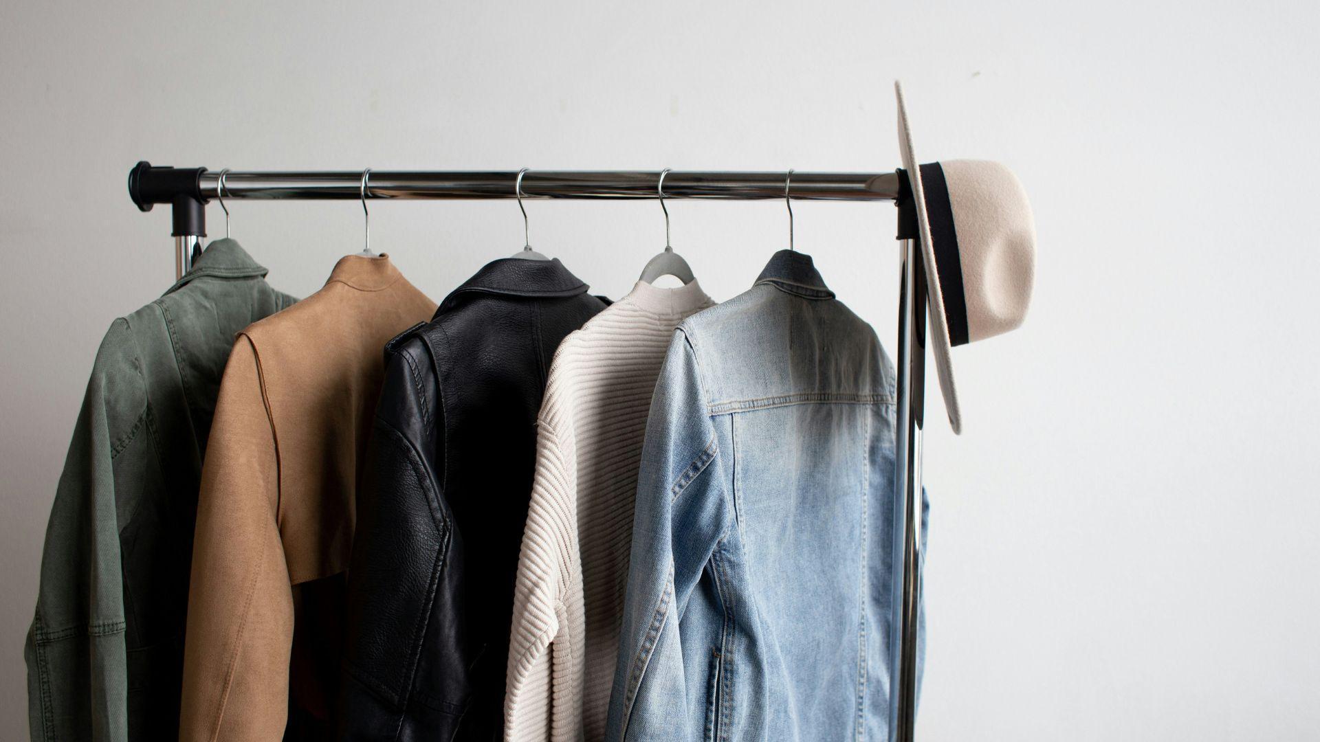 Clothes on a freestanding rail; illustrative photograph.