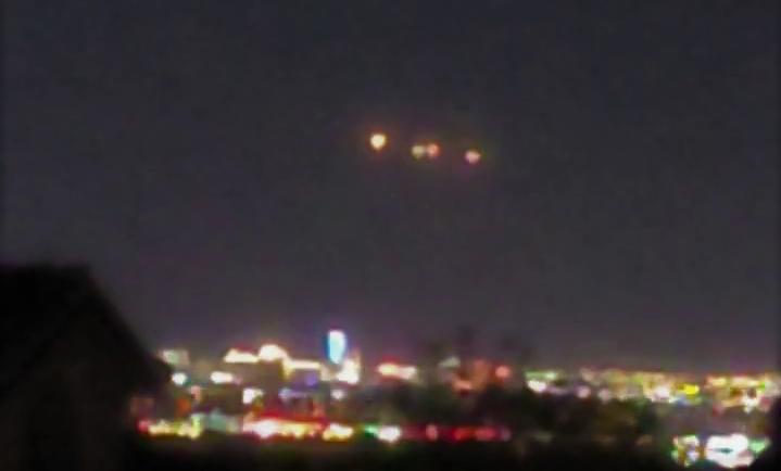 Archive image of distant lights at night; not authenticated as this sighting.