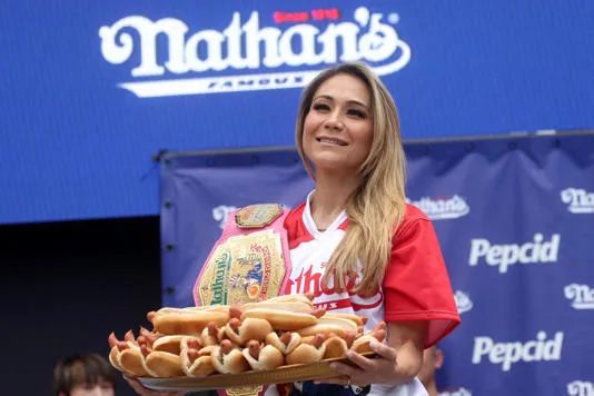 Illustration for “Nathan's Hot Dog Eating Contest 2024 : A Unique July 4th Tradition”