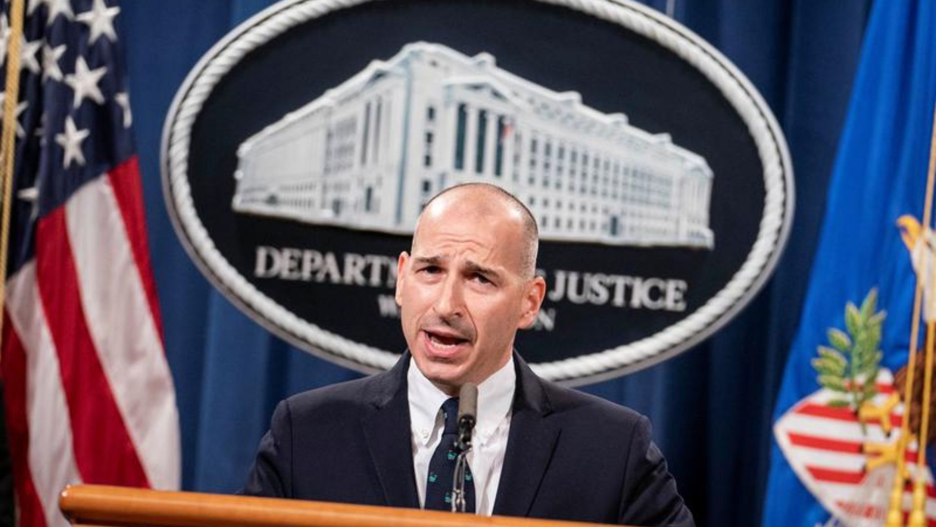 A Justice Department official at a lectern; archive image.