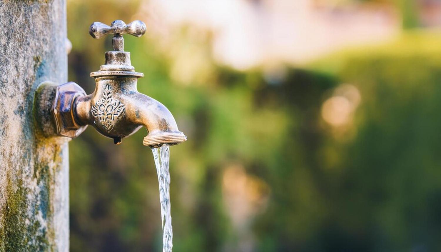 Illustrative photograph of water flowing from an outdoor tap.