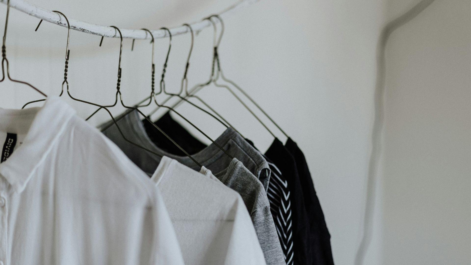 Shirts on hangers; illustrative photograph.
