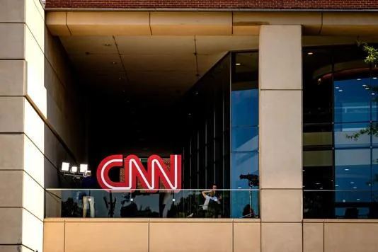 Illustration for “CNN Downsizes, Cuts 100 Staff Positions”