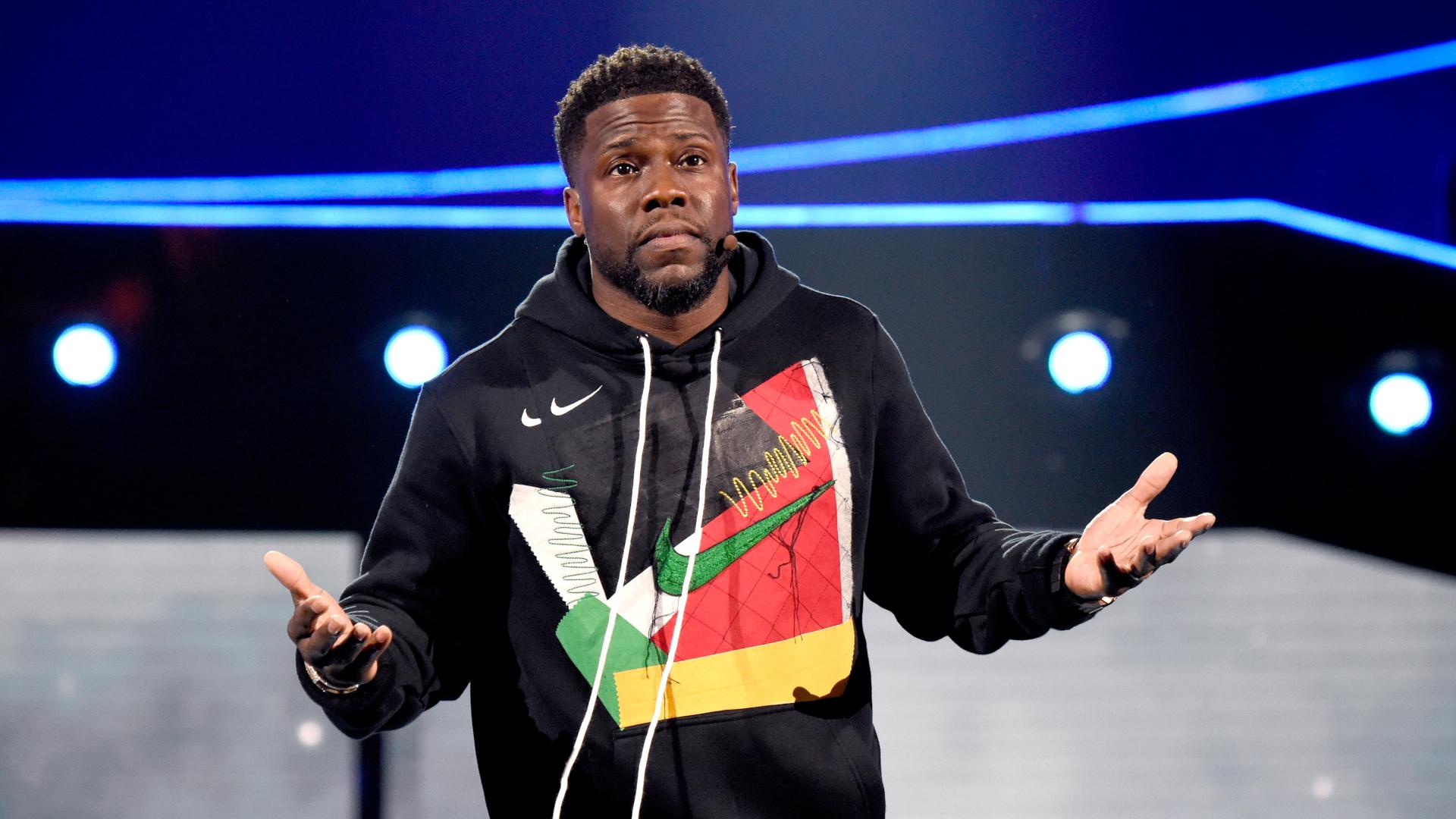 Kevin Hart speaking onstage
