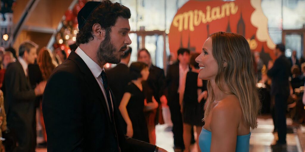 Adam Brody and Kristen Bell talking in a scene from Nobody Wants This