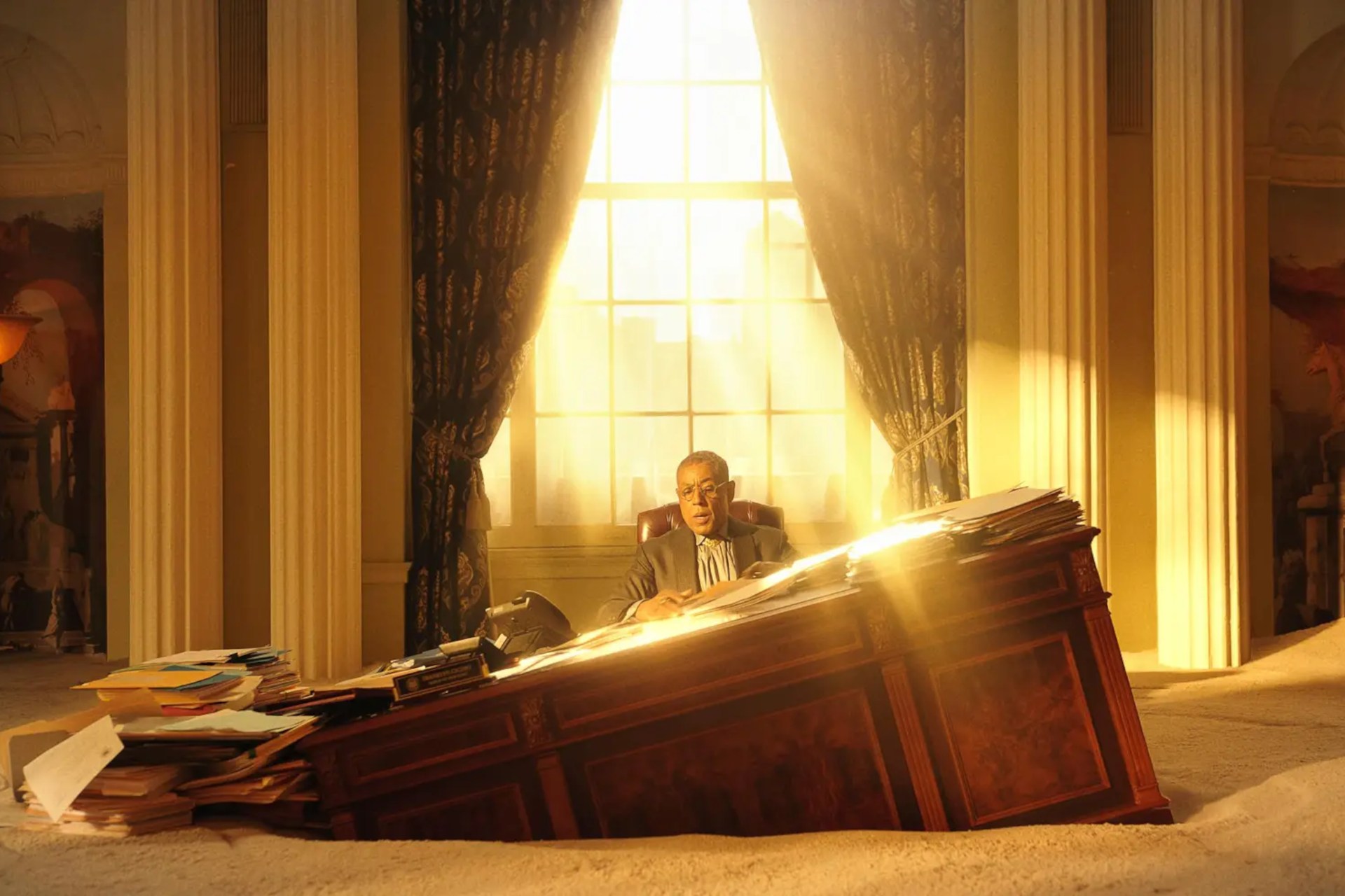 Laurence Fishburne at a desk in a scene from Megalopolis